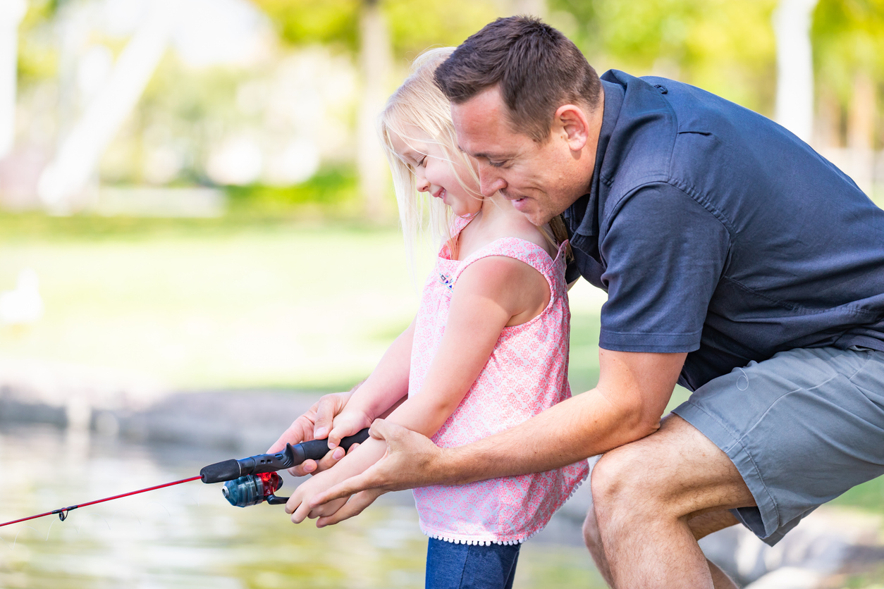 father and daughter fishing iStock 955507238