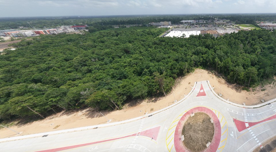 Drone image of a portion of this parcel. Prien Plaza is in the background